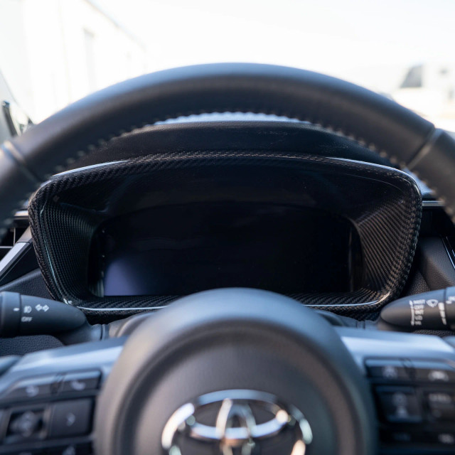 Driven.Media Carbon Fiber Gauge Cluster Surround for the GR Corolla 2023+ — 3