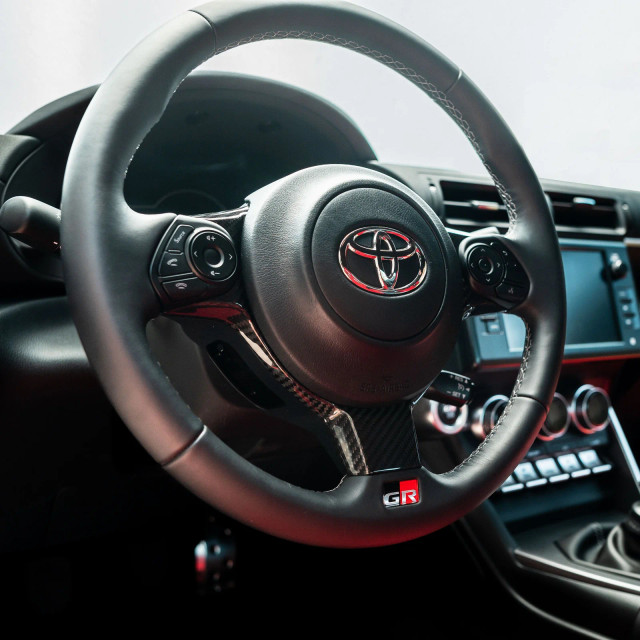 Driven.Media Carbon Fiber Steering Wheel Trim for the GR86 / BRZ 2022+ — 2