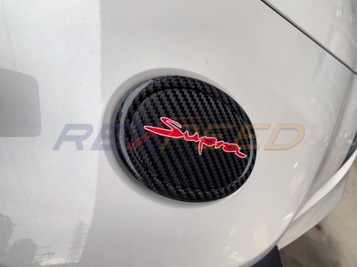 Rexpeed Dry Carbon Emblem Cover for the GR Supra 2020+ — 2